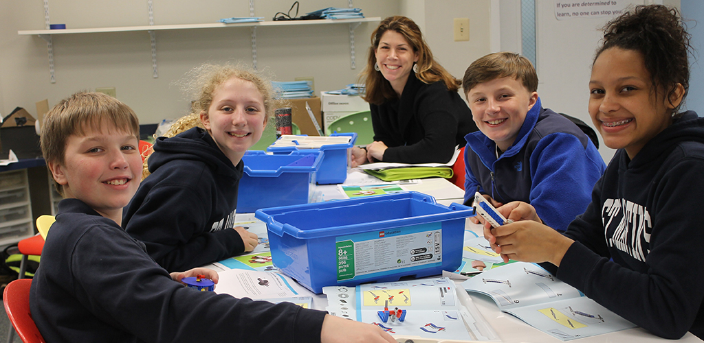 MiddleSchoolNew Teacher with Children in Lab
